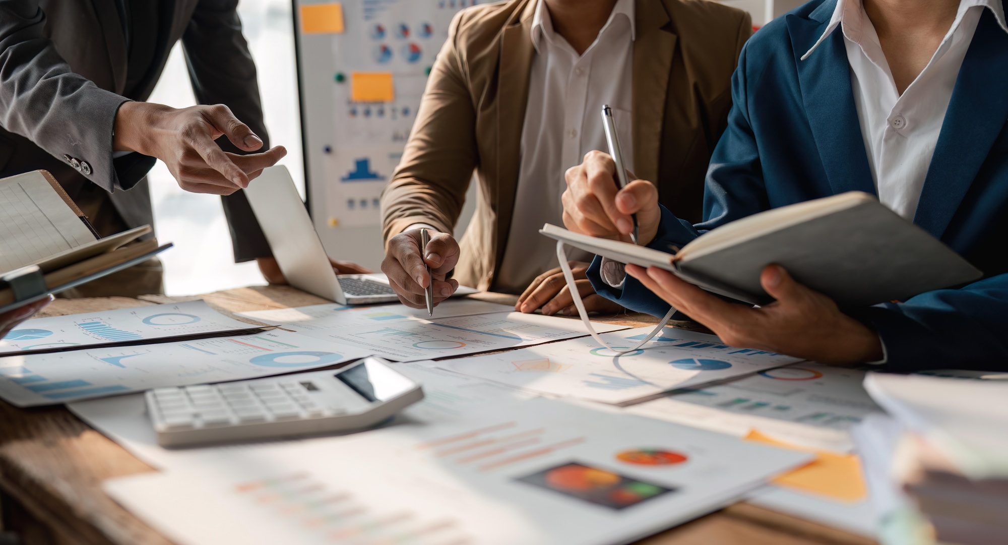 Business Consulting meeting working and brainstorming analyzing new business project finance