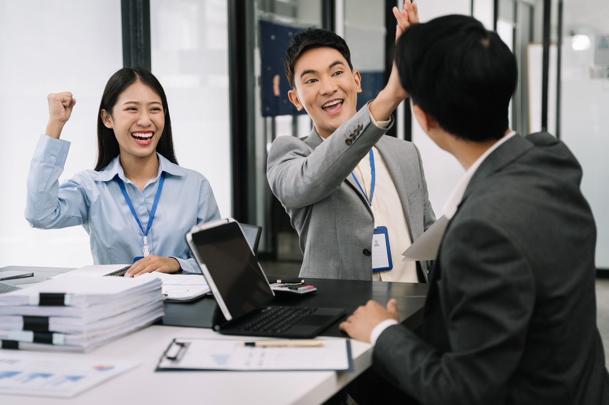 Happy smiling businessman feel happy work complete Teamwork success